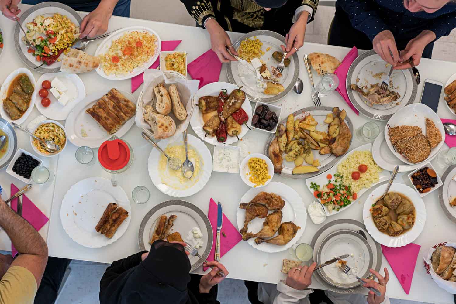 Muslim family gathering for having Iftar in Ramadan together