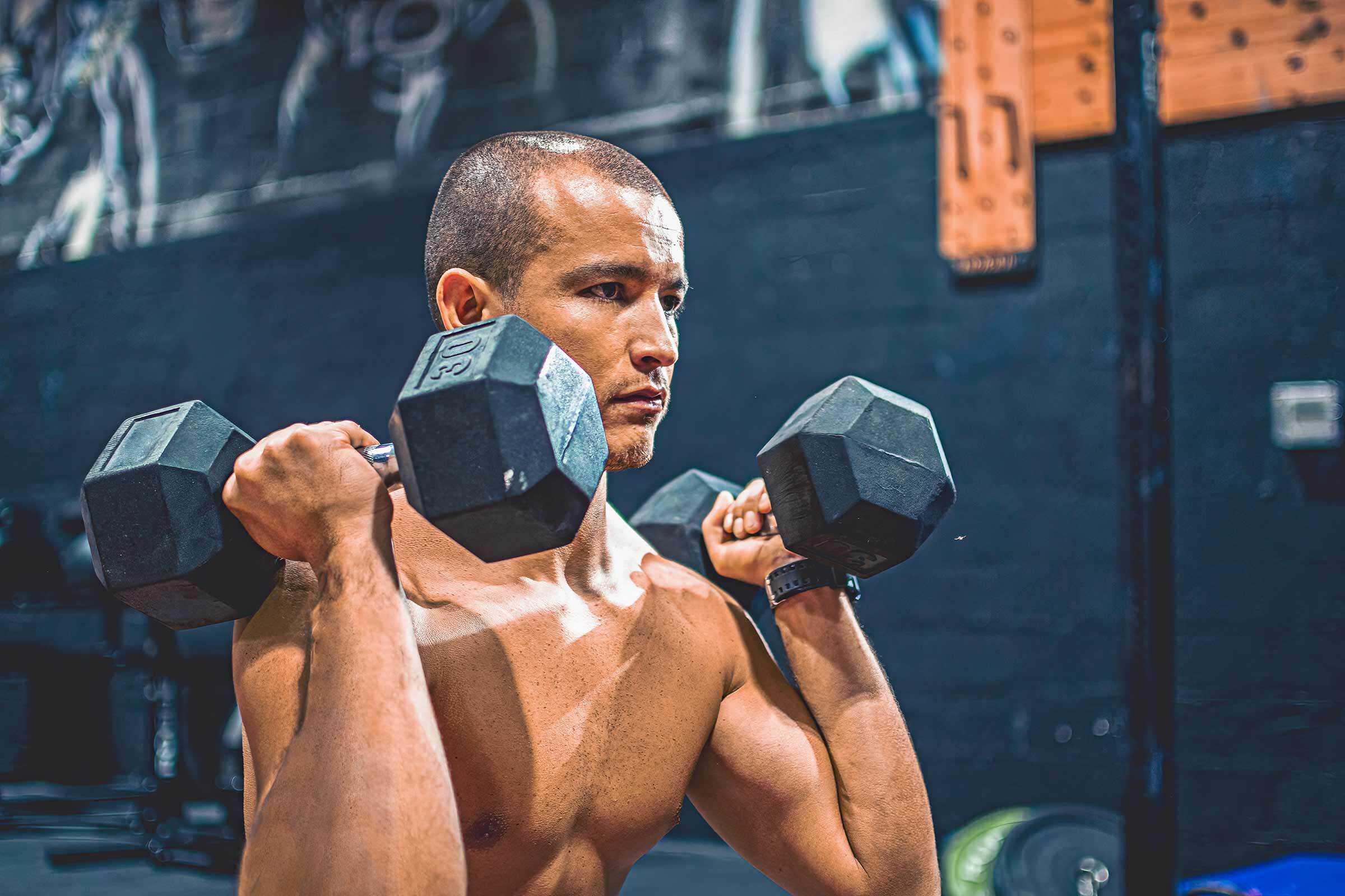 kettlebells in green grass - fitness concept outdoors